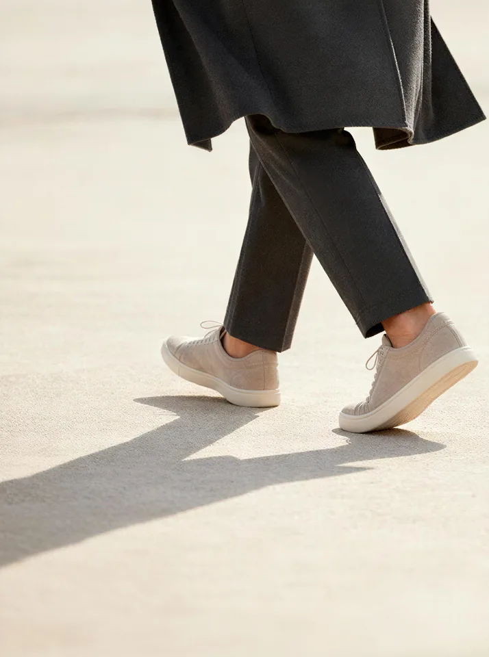 Person walking in soft light