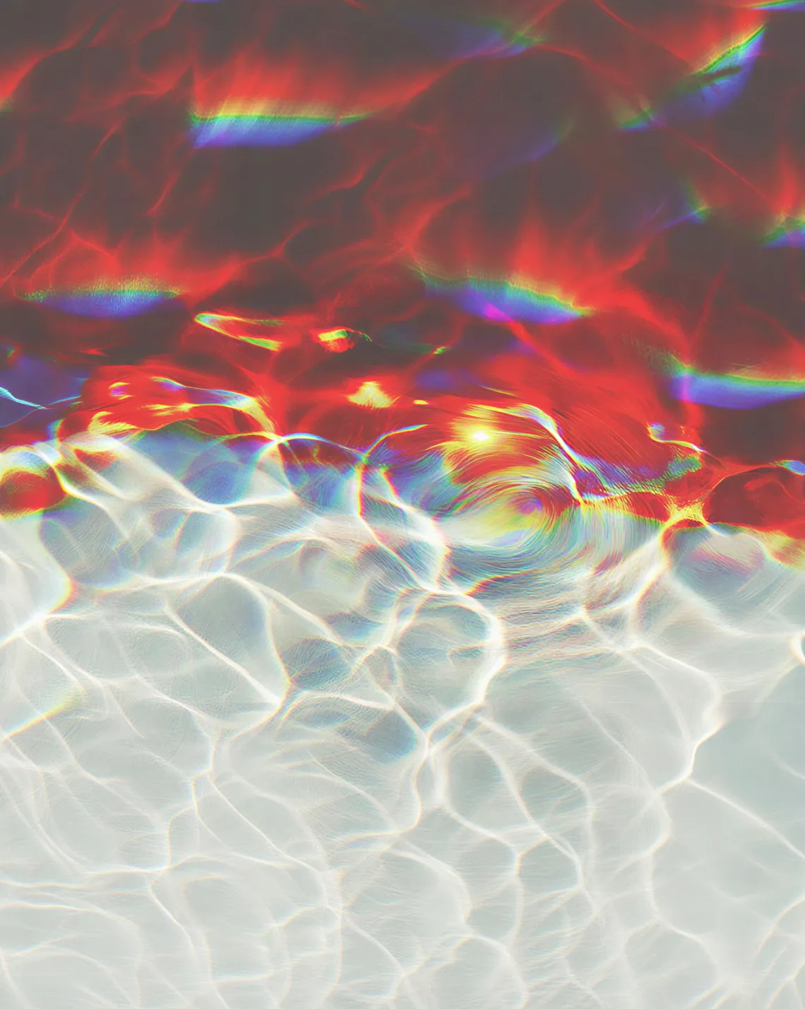 Abstract light refraction over rippled water